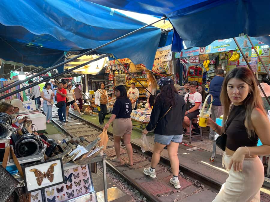 1-Day Trip: Floating Market & Railway Market by Toyota Camry - Coconut sugar, canal scenery, and market food
