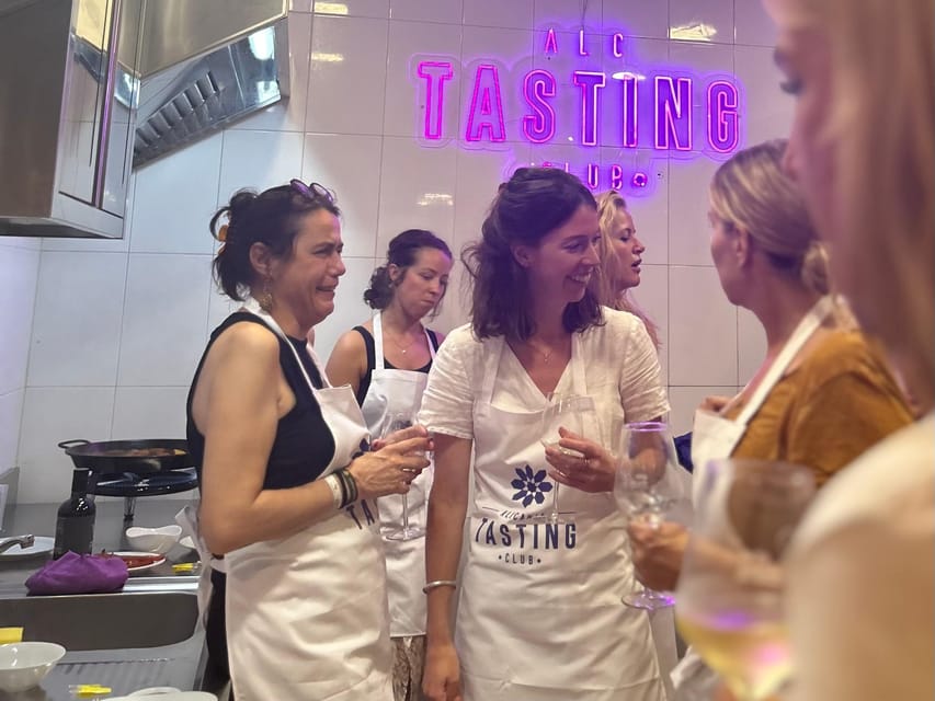 Alicante Paella Cooking Class, Tapas, Drinks and Market - Eating the rice you helped prepare