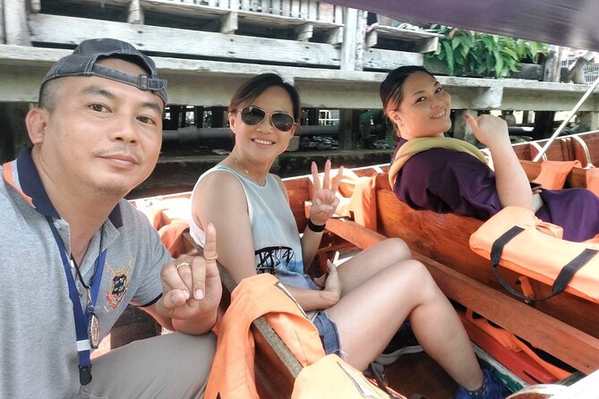 Amphawa and Railway Markets with Boat Ride Group Tour - Timing, transport, and the Bangkok return