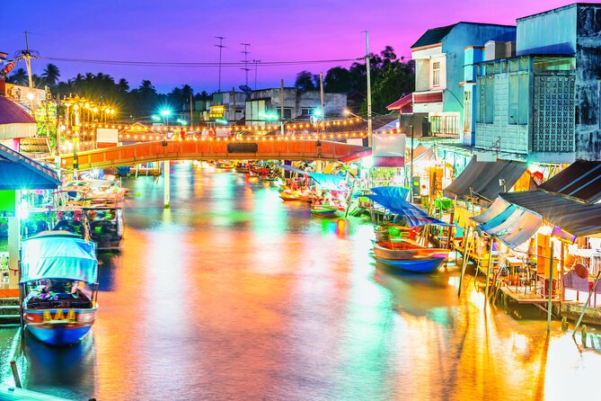 Amphawa Boat Ride & Railway Market: Multi-Lang Private Tour - Finding Wat Bang Kung inside the banyan tree