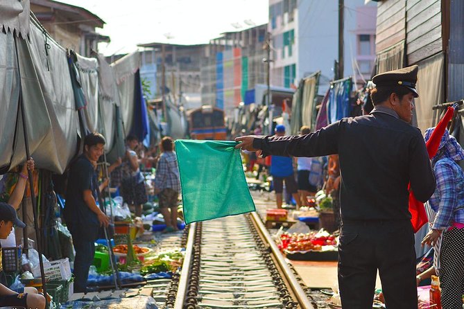 Amphawa Floating Market Tour with Maeklong Railway Market (SHA Plus) - Maeklong Railway Market and the train through the stalls