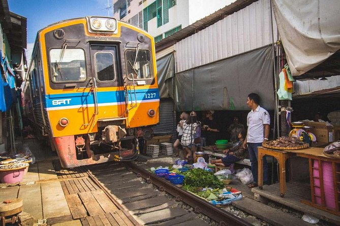 Amphawa Floating Market Tour with Maeklong Railway Market (SHA Plus) - The long-tail boat is more than a photo prop