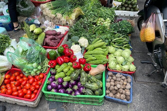 Authentic Vietnamese Cooking Class with Market Visit in HCMc - Walking through Ben Thanh Market with an instructor