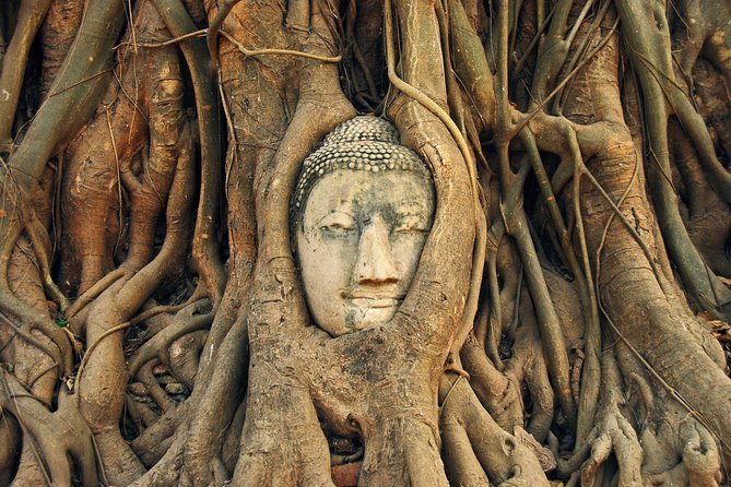 Ayutthaya Sunset Tour: Iconic Temples & Scenic River Boat Ride - Wat Yai Chai Mongkhon sets the mood