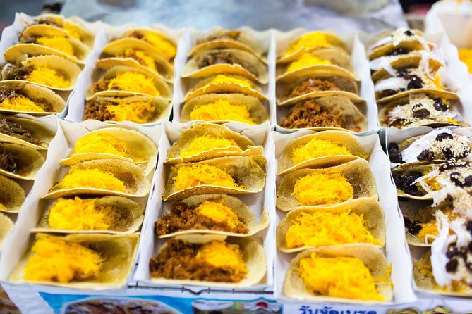 Bangkok by Night: Temples, Markets and Food Tuk-Tuk Tour - Guides, group size, and the pace of the evening