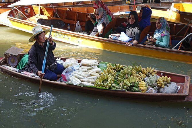 Bangkok Damnoen Floating Market and Maeklong Railway Private Tour - Maeklong Railway Market: shopping beside the tracks