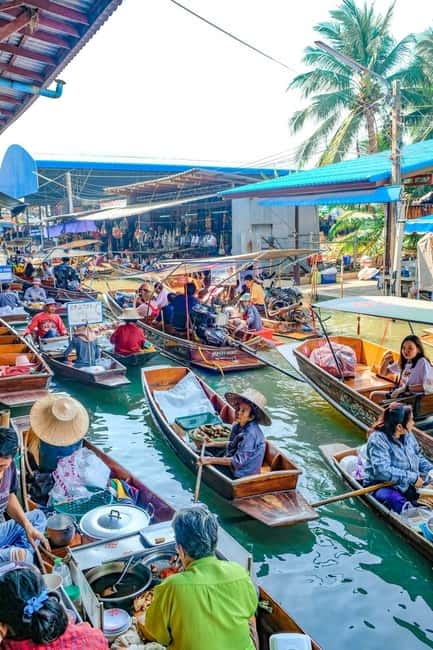 Bangkok: Famous Markets and Dragon Temple Guided Day Tour - Damnoen Saduak and its busy canal traffic