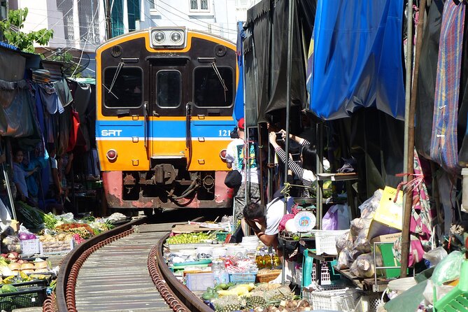 Bangkok: Floating Market and Train Tour with Guide in Spanish and English - Cost, Comfort, and What You Actually Get