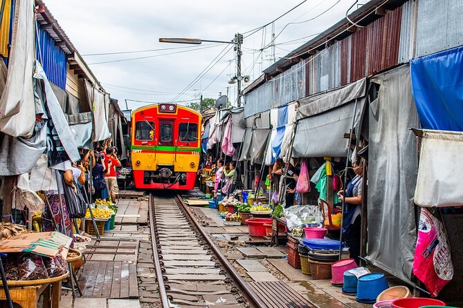 Bangkok: Floating Market and Train Tour with Guide in Spanish and English - The Road to Ratchaburi and the Canal Market