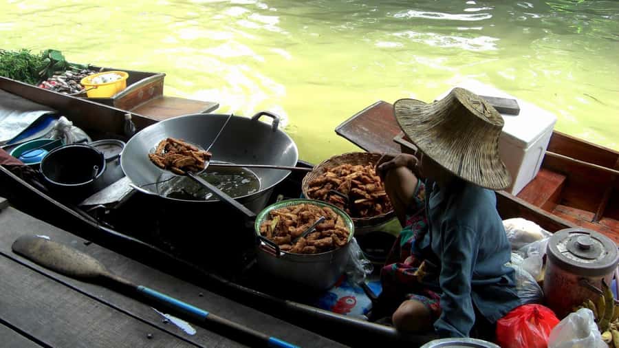 Bangkok highlight: Floating Market, Train Market & Ayutthaya - Maeklong Railway Market, where the rails cut through shopping