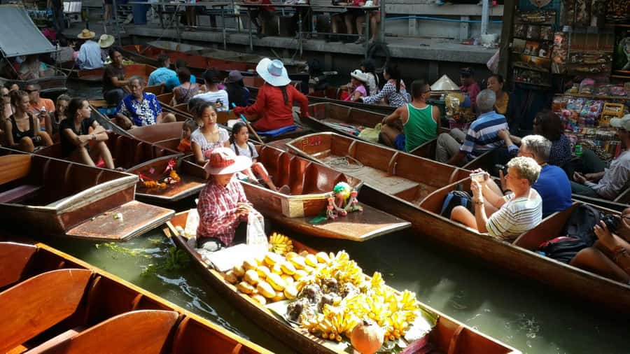 Bangkok: Maeklong Railway & Damnoen Saduak Floating Markets - Standing beside the train at Maeklong