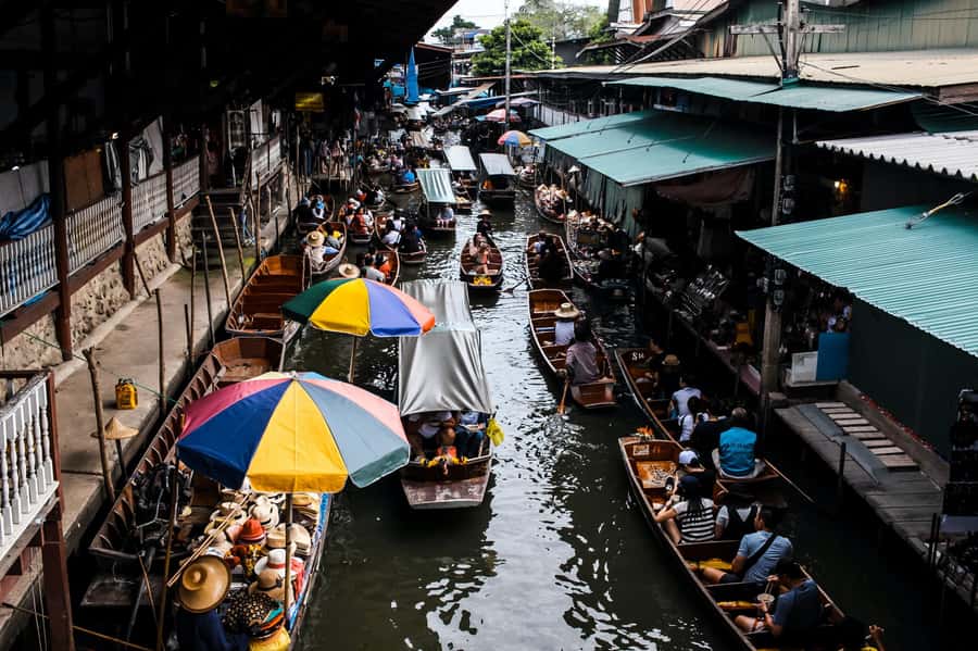 Bangkok: Maeklong Train Market & Floating Market Day Tour - The train at Maeklong Railway Market