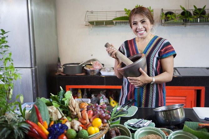 Bangkok Market Tour & Thai Cooking Class with Boat Ride with Aoy - Eating beside the river