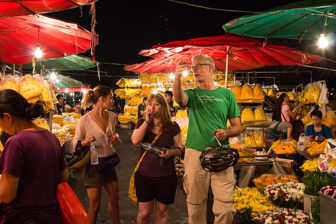 Bangkok: Night Bike Tour with Temples & Flower Market Visit - Wat Rakang and a quieter riverside route