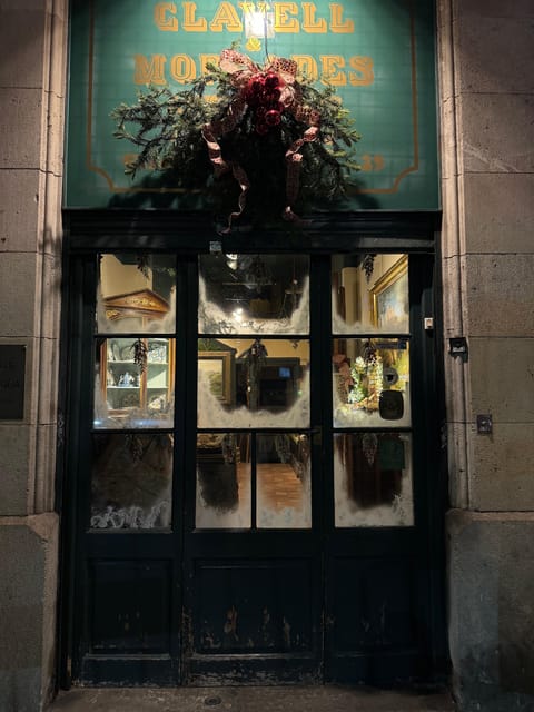 Barcelona: Christmas Lights and Markets Bike Tour - Hospital de Sant Pau under Christmas lights