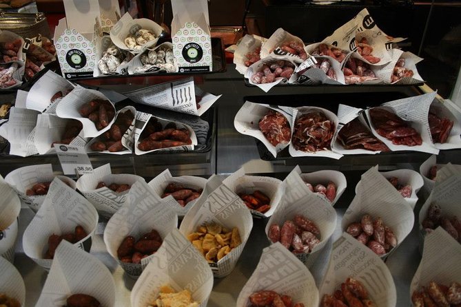 Barcelona Food Tour: Market & Gothic Quarter with Expert Guide - Walking through the Gothic Quarter
