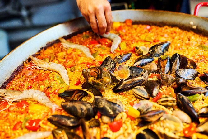 Barcelona Paella Cooking Class with Market Visit, Tapas & Sangria - Tapas, sangria, and a friendly kitchen table