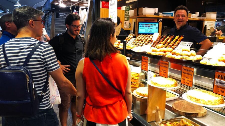 Barcelona: Street Food & Sightseeing Tour with Local Market - Family-run stops beyond the market
