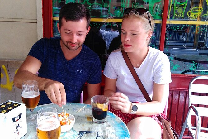 Barcelona Street Food Tour with Local Market & City Center Visit - Plaça del Rei and Barcelona’s Earlier Layers