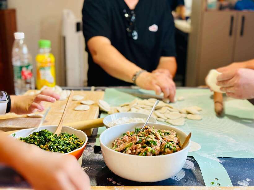 Beijing: Dumpling-Making Class with wet Market visit - The family meal is part of the lesson