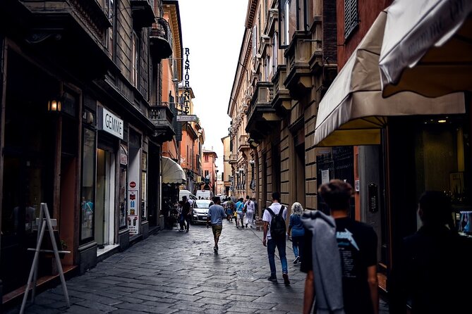Bologna Food & Market Tour with 6 Tastings, Pasta, Wines & More - Parmigiano Reggiano, Cured Meats, and the Secret Dish
