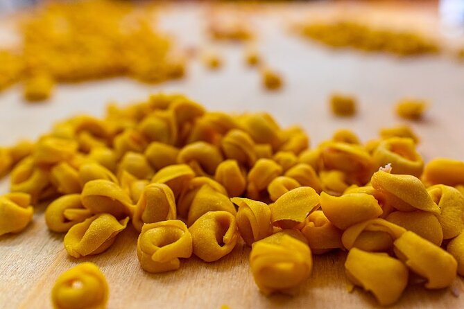 Bologna Food & Market Tour with 6 Tastings, Pasta, Wines & More - Comparing Modena Balsamic Vinegar