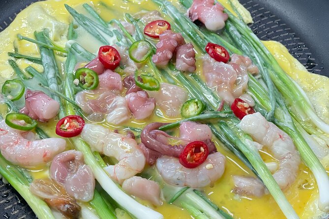 Busan Local Food Cooking Class with Market Tour - Eating your own work with rice wine