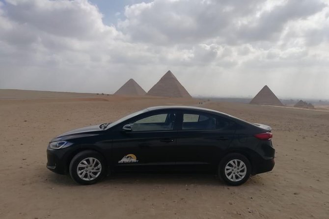 CAIRO LAYOVER EXCURSION TO GIZA PYRAMIDS SPHINX COPTIC CAIRO and BAZAAR - Starting at Cairo Airport in a private car