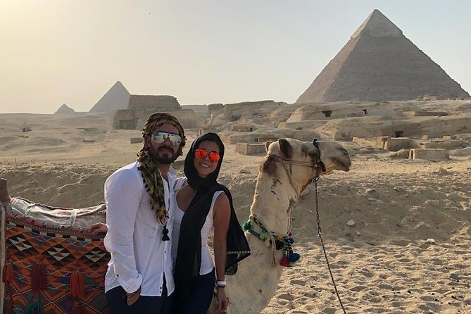 Cairo layover tour Giza pyramids Egyptian museum local bazaars Camel ride Lunch - Giza with Cheops, Chephren, and Myckrenes