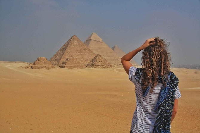 Cairo Layover Tour to Giza Pyramids Sphinx,Coptic Cairo & Old Bazaar - Camel riding near the pyramids
