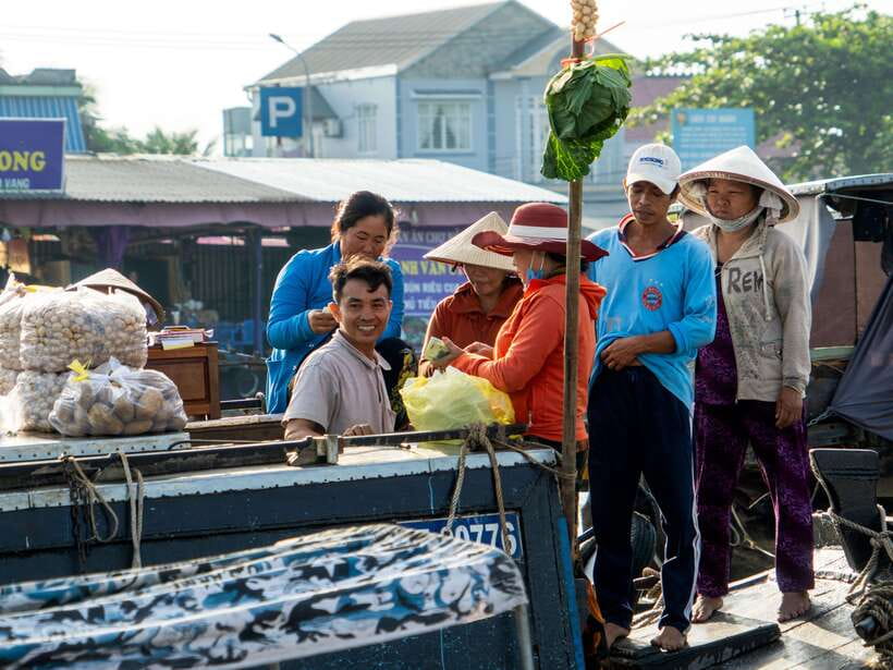 Can Tho: Explore Mekong, Floating Market, Cacao & Local Life - Fresh pineapple and everyday boat life
