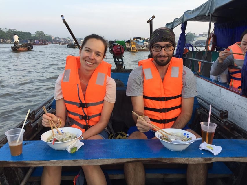 Can Tho: Mekong Delta and Cai Rang Floating Market Tour - Crossing the Mekong at sunrise