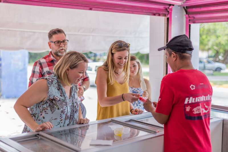 Cancún: Street Food, Local Market and Urban Art Tour - Stop four: cochinita pibil and dessert at Carlos Nader 25