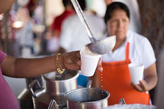 Cancun Street Food Tour with Food Stalls, Local Market and Murals - Bonampak murals and a quick photo stop