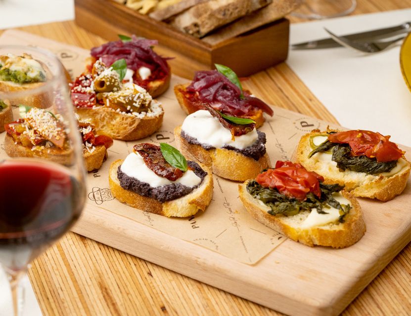 Catania: Volcanic Wine Tasting in a Metropolitan Market - Four glasses, four food matches