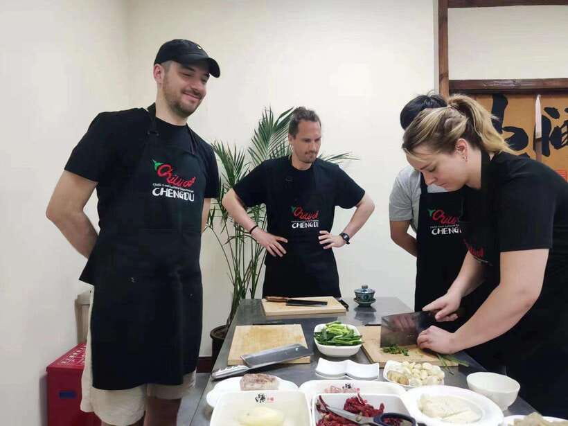Chengdu: Cooking Class with Fresh Market Half Day Experience - Preparing several Sichuan dishes