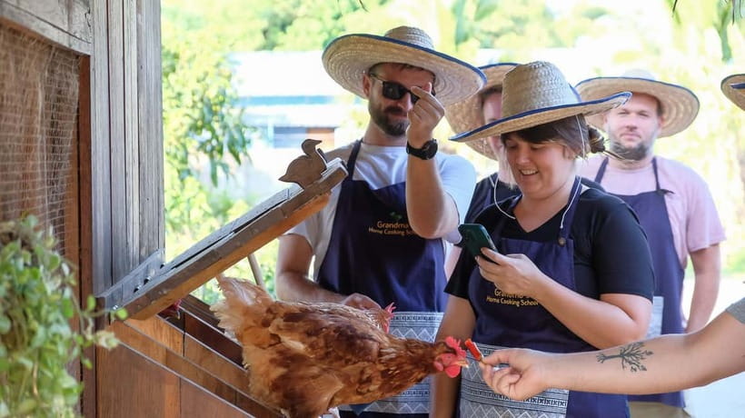 Chiang Mai: Authentic Cooking Class with Market & Farm Visit - Your own station makes the cooking useful