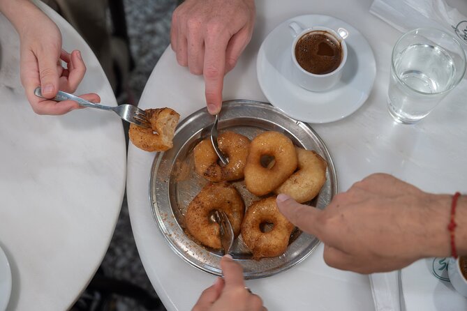 Classic Athens Food Tour with Local Drink & Market Visit - A restaurant stop for spirits and regional food