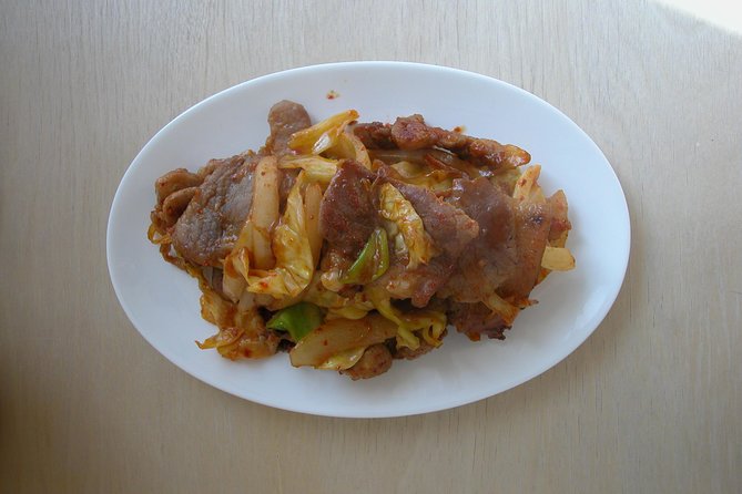 Cook 3 Authentic Korean Dishes with Local Market Tour - Cooking three Korean dishes from start to finish