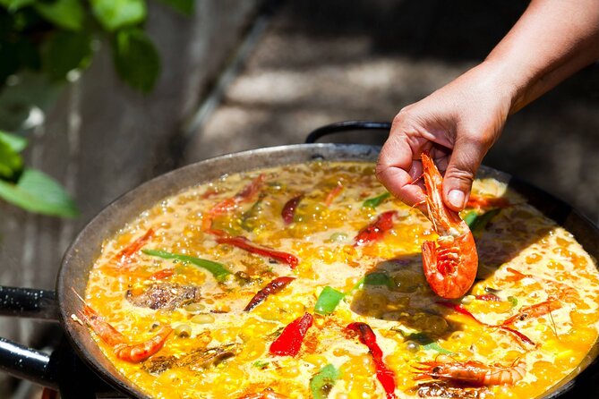 Cook Paella & Tapas + Market Tour in Barcelona (4-Course Meal) - Making tortilla with potatoes, onions, and eggs