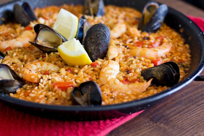 Cook Paella & Tapas + Market Tour in Barcelona (4-Course Meal) - Choosing ingredients at a Barcelona market