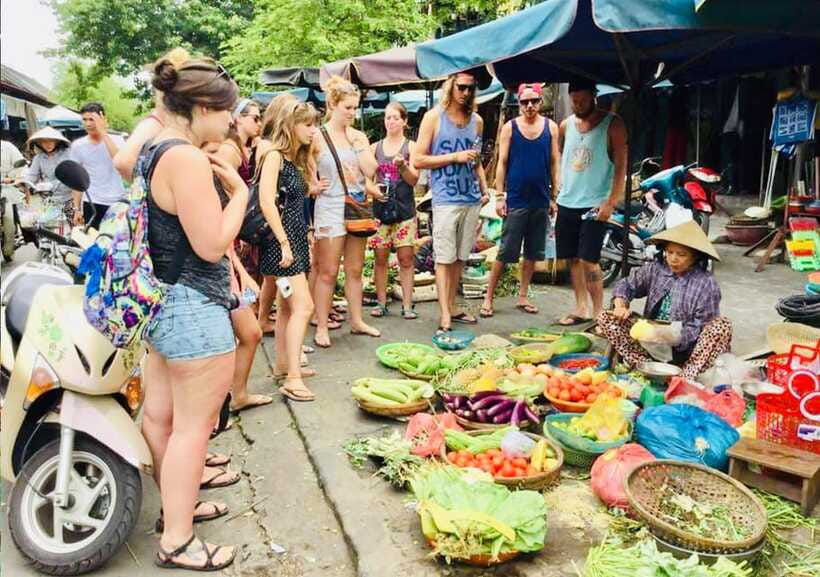 Da Nang/Hoi An: Market Tour, Basket Boat Ride, Cooking Class - Sitting down to eat what you made
