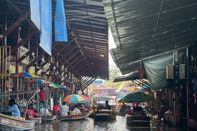 Damnoen Saduak and Maeklong Railway Market Tour with Private Car - Maeklong Railway Market and the train that cuts through it