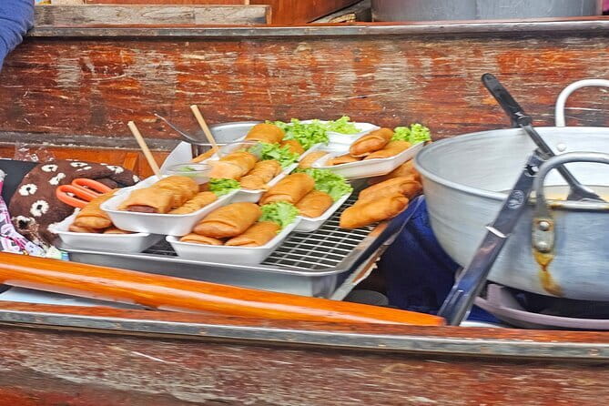 Damnoen Saduak Famous Floating Market and Mea Klong Railway Tour - The 90-minute ride to Samut Songkhram