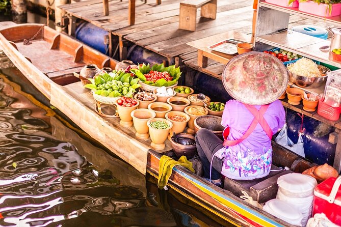 Damnoen Saduak Floating Market and Maeklong Railway Market Tour - Wat Bang Kung and the banyan-root chapel