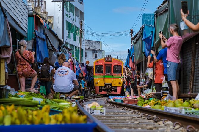 Damnoen Saduak Floating Market and Maeklong Railway Market Tour - Damnoen Saduak begins with a boat ride