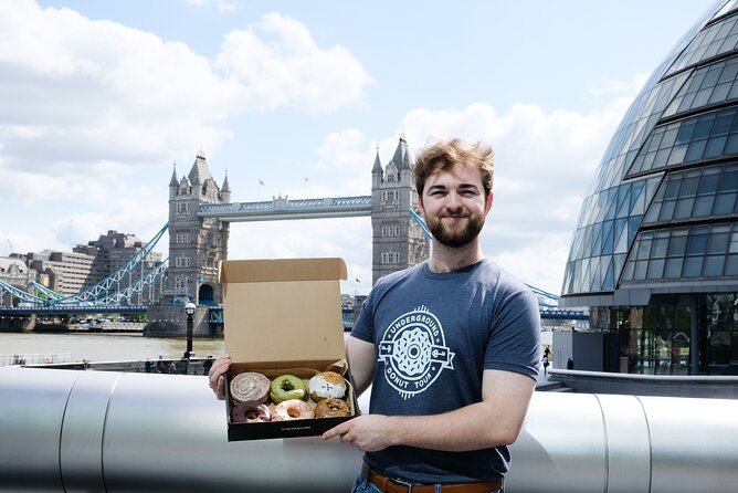 Delicious Doughnuts & Tea: Small-Group Borough Market Experience - Walking through Borough Market between bites