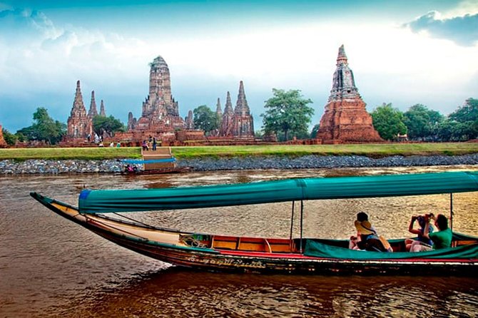 Discover Ayutthaya at Sunset: Historic Temples & River Cruise - Wat Mahathat and the Buddha in the tree