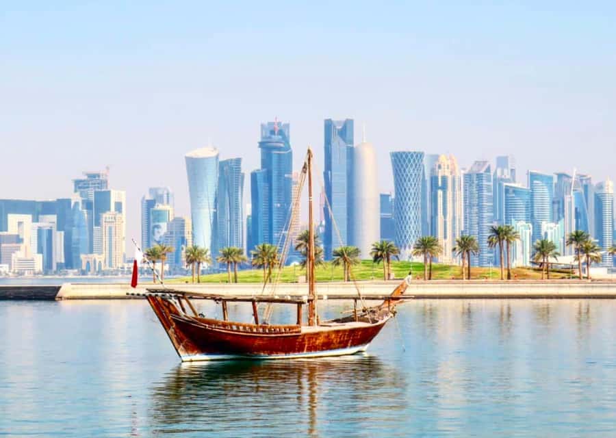 Doha: City Tour,Corniche,Souq Waqif,The Pearl,and Katara - Reading Doha from the dhow harbor and Corniche