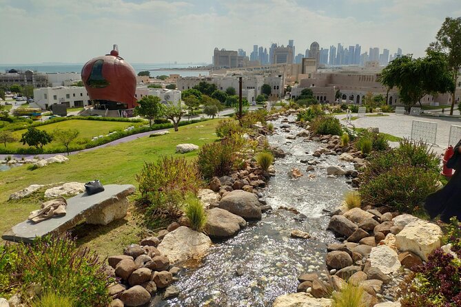 Doha City Tour: Guided Tour to Souq Waqif, Katara, Pearl Island - Transport, timing, and group size